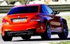 bmw-1-series-m-coupe_rear_side_view.jpg