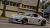 photo_13185_rocket_bunny_porsche_cayman_299838_fh.jpg